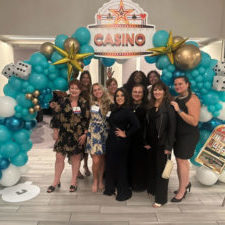 2023 ITWomen volunteers celebrate return of signature fundraiser Celebrity CIO Texas Hold'em Tournament & Casino night for Engineering and Tech scholarships for girls.